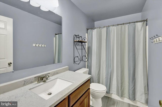 bathroom with toilet, wood finished floors, vanity, and a shower with shower curtain