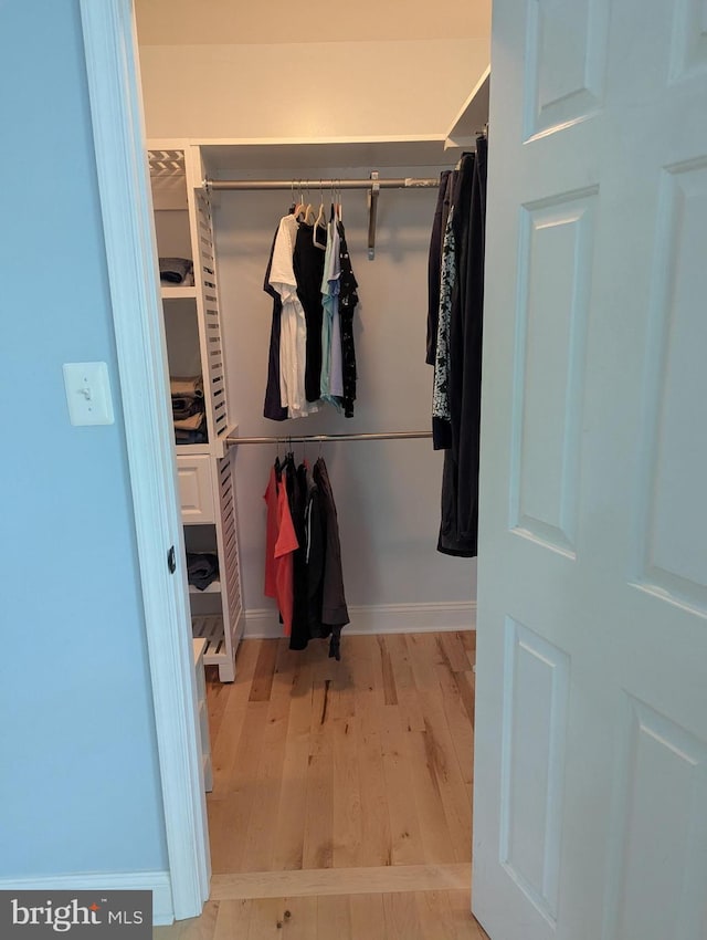 10995 Alcorn Ln, Waldorf, MD 20603 - walk in closet featuring wood finished floors