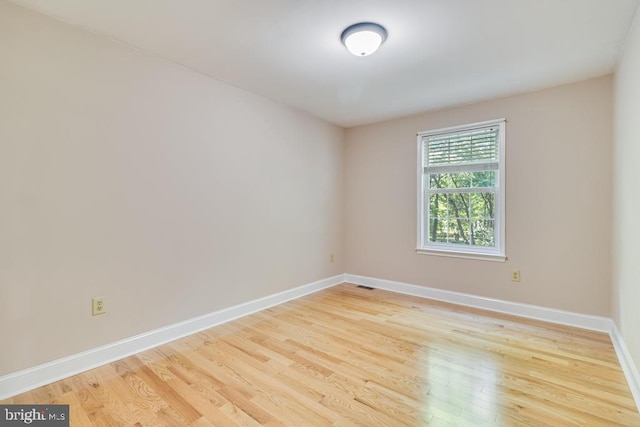 10995 Alcorn Ln, Waldorf, MD 20603 - empty room featuring wood finished floors and baseboards