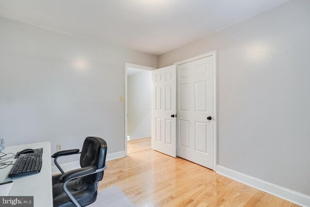10995 Alcorn Ln, Waldorf, MD 20603 - home office with wood finished floors and baseboards