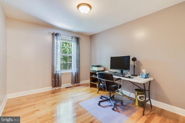 10995 Alcorn Ln, Waldorf, MD 20603 - office area featuring wood finished floors and baseboards