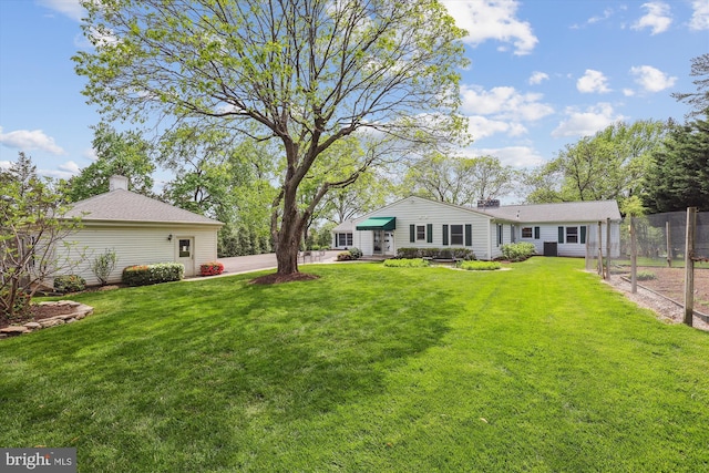 view of yard with fence