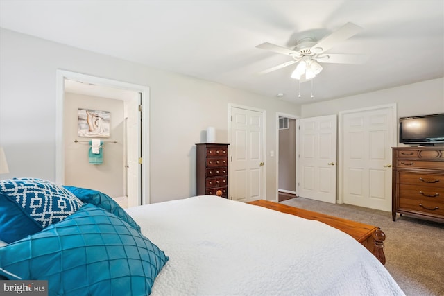 bedroom featuring ceiling fan and carpet