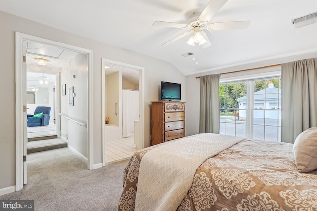bedroom with visible vents, baseboards, carpet floors, and lofted ceiling