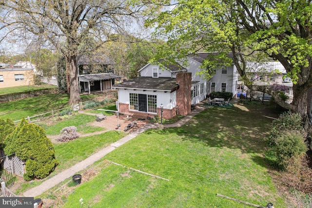 view of yard with fence