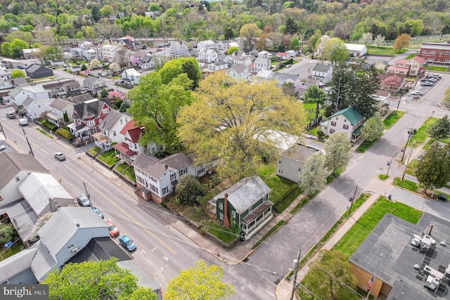 birds eye view of property with a residential view