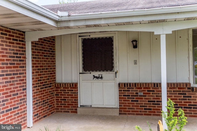 2500 Eberhart Rd, Quakertown, PA 18951 - property entrance featuring board and batten siding, brick siding, and roof with shingles