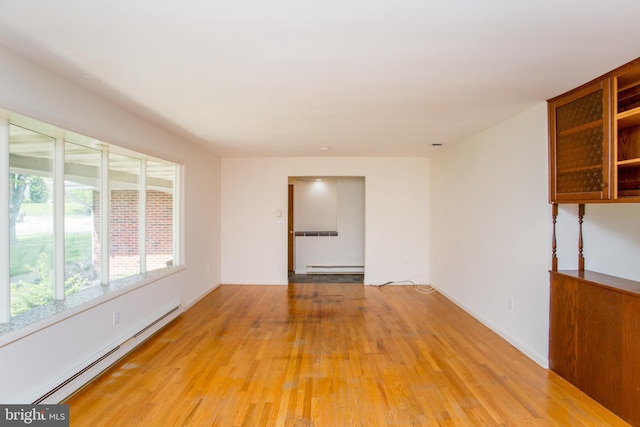 2500 Eberhart Rd, Quakertown, PA 18951 - spare room with light wood-type flooring and a baseboard heating unit