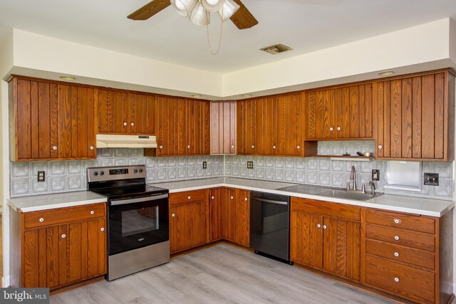 2500 Eberhart Rd, Quakertown, PA 18951 - kitchen featuring electric range, ceiling fan, black dishwasher, under cabinet range hood, and a sink