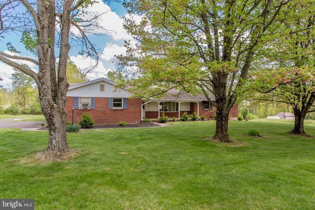 2500 Eberhart Rd, Quakertown, PA 18951 - single story home featuring a porch, a front lawn, and brick siding