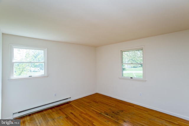 2500 Eberhart Rd, Quakertown, PA 18951 - spare room with baseboards, a baseboard radiator, and hardwood / wood-style flooring