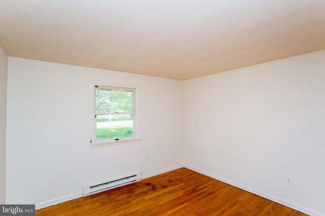 2500 Eberhart Rd, Quakertown, PA 18951 - empty room featuring baseboards, a baseboard radiator, and wood finished floors
