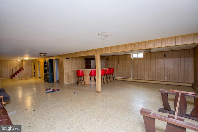 2500 Eberhart Rd, Quakertown, PA 18951 - below grade area featuring wooden walls, a bar, and stairway