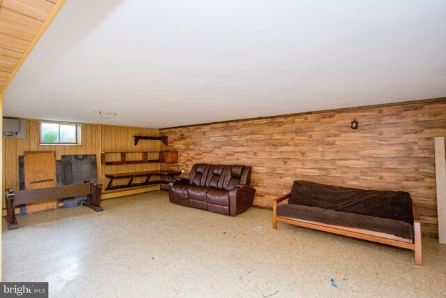 2500 Eberhart Rd, Quakertown, PA 18951 - living area featuring wooden walls, an AC wall unit, and tile patterned floors