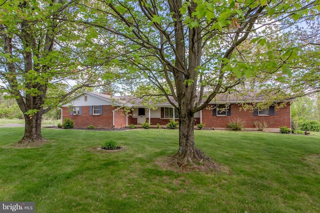 2500 Eberhart Rd, Quakertown, PA 18951 - ranch-style house featuring a front yard and brick siding