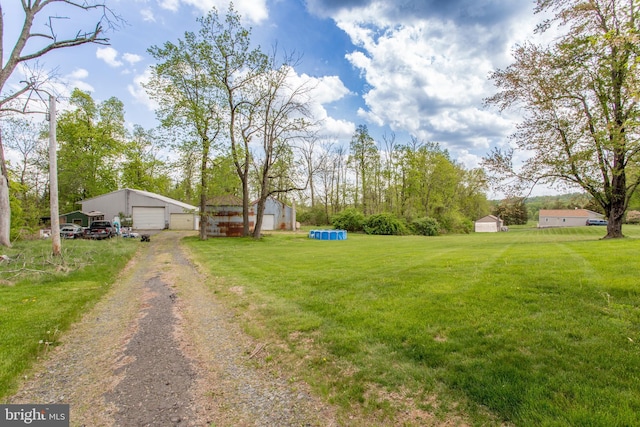 2500 Eberhart Rd, Quakertown, PA 18951 - view of yard with an outdoor structure and a garage