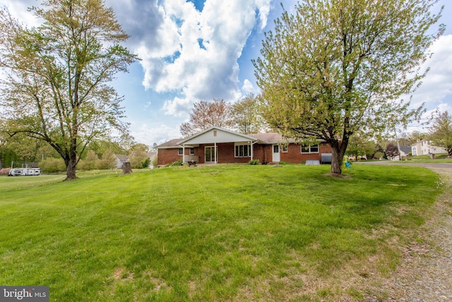 2500 Eberhart Rd, Quakertown, PA 18951 - ranch-style home with brick siding and a front lawn