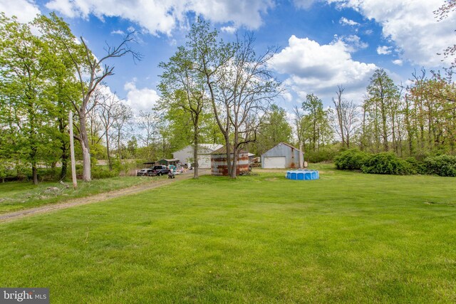 2500 Eberhart Rd, Quakertown, PA 18951 - view of yard with a detached garage and an outbuilding