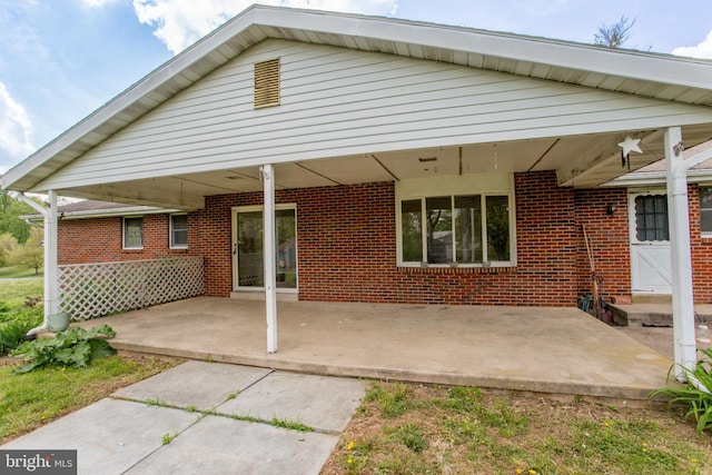 2500 Eberhart Rd, Quakertown, PA 18951 - back of house featuring a patio and brick siding