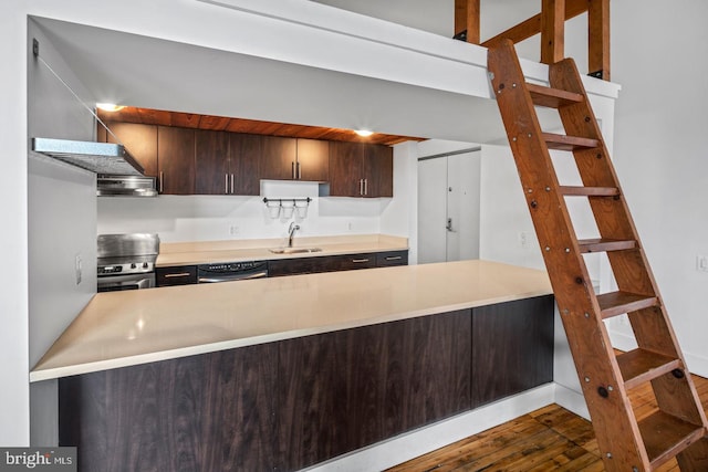 kitchen with dark brown cabinetry, a sink, dishwasher, electric stove, and a peninsula
