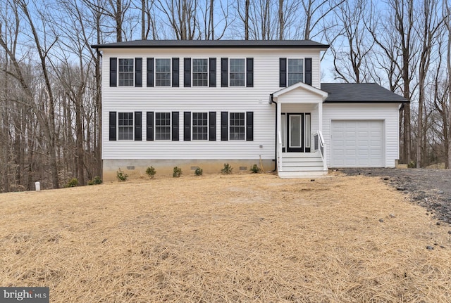 6955 Solomons Island Rd N, Sunderland, MD 20689 - colonial inspired home featuring dirt driveway and a garage