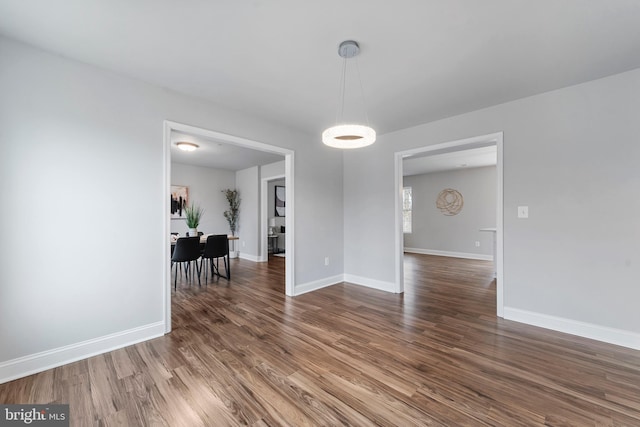 6955 Solomons Island Rd N, Sunderland, MD 20689 - dining area with wood finished floors and baseboards