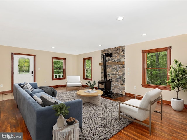 10433 Grindstone Run Rd, Myersville, MD 21773 - living area featuring a wood stove, healthy amount of natural light, baseboards, and recessed lighting