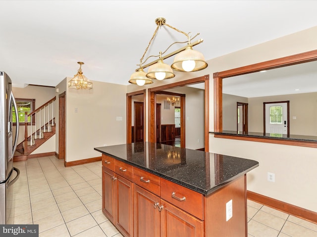 10433 Grindstone Run Rd, Myersville, MD 21773 - kitchen featuring a chandelier, light tile patterned floors, plenty of natural light, and baseboards