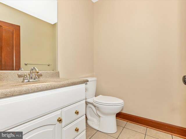 10433 Grindstone Run Rd, Myersville, MD 21773 - half bath with tile patterned floors, vanity, toilet, and baseboards