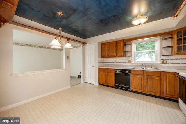 kitchen with black dishwasher, open shelves, a sink, brown cabinetry, and light countertops