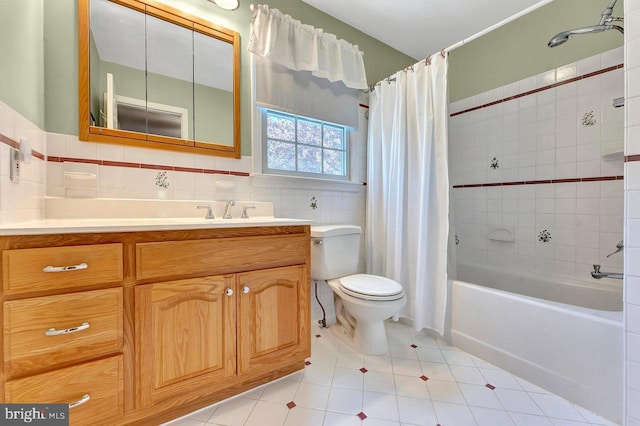 79 Wolfpack Rd, Hamilton, NJ 08619 - full bathroom with shower / bath combination with curtain, tile walls, tile patterned floors, vanity, and toilet