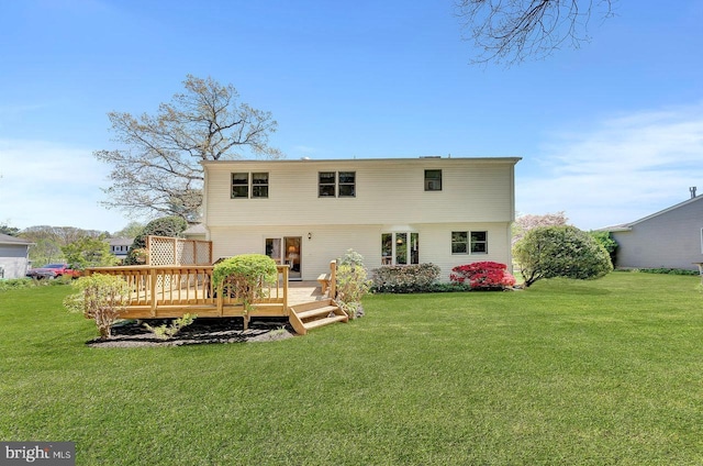 79 Wolfpack Rd, Hamilton, NJ 08619 - rear view of house with a lawn and a deck