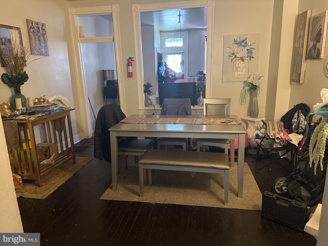 dining room with hardwood / wood-style floors