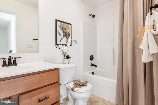 bathroom with toilet, tile patterned floors, shower / tub combo with curtain, and vanity