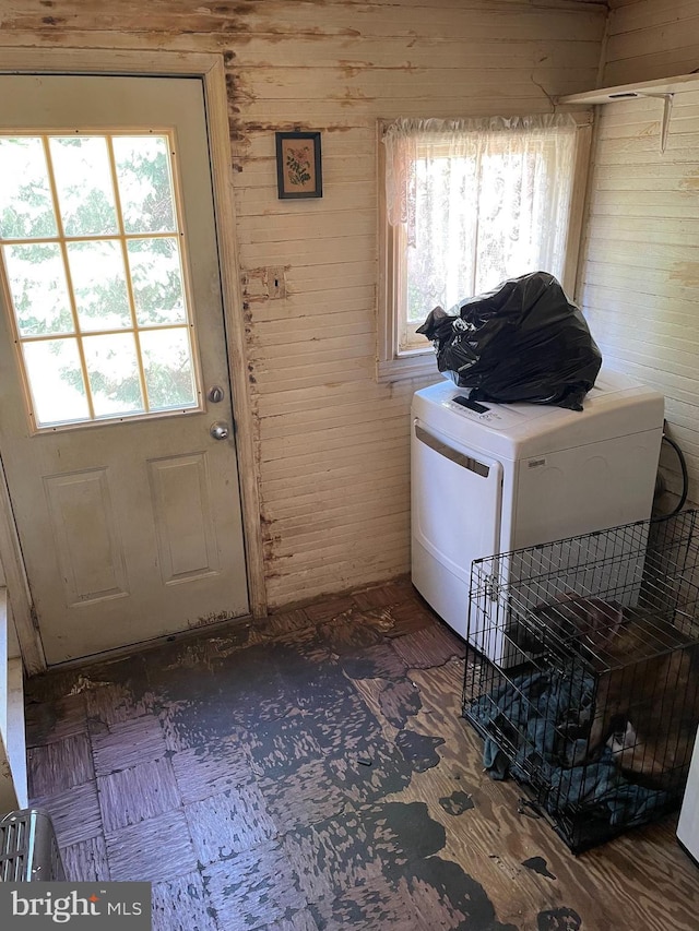 45 W Essex Ave, Lansdowne, PA 19050 - laundry area featuring wooden walls, a healthy amount of sunlight, and laundry area