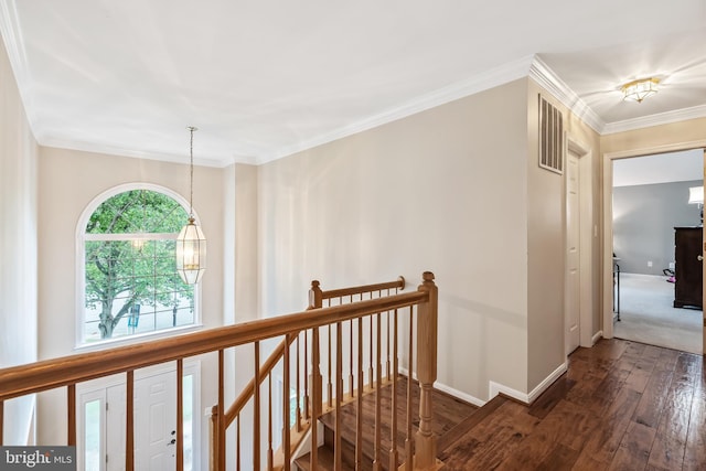 9804 Luck Penny Ct, Bristow, VA 20136 - corridor featuring an upstairs landing, hardwood / wood-style floors, baseboards, crown molding, and a chandelier