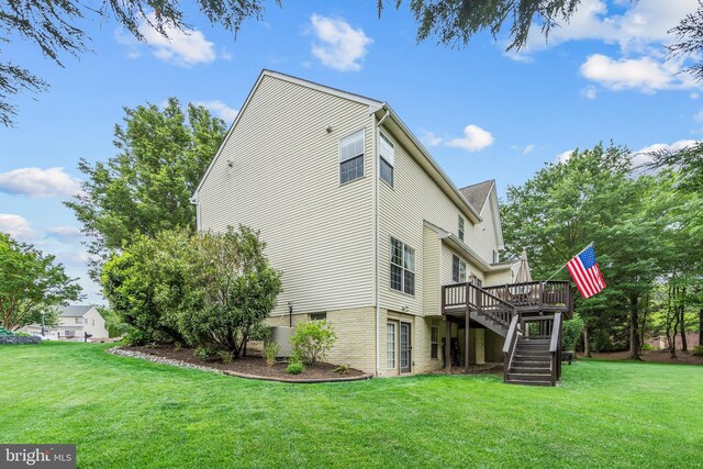 9804 Luck Penny Ct, Bristow, VA 20136 - back of house featuring a deck, stairs, and a lawn