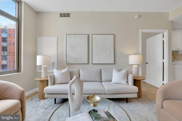 3600 S Glebe Rd Unit 321W, Arlington, VA 22202 - living area featuring wood finished floors