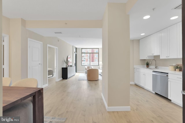 3600 S Glebe Rd Unit 321W, Arlington, VA 22202 - kitchen with stainless steel dishwasher, baseboards, light wood-type flooring, a sink, and recessed lighting