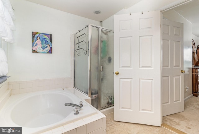 full bath with a stall shower and a bath
