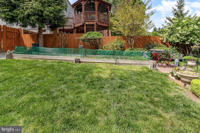 view of yard with a fenced backyard
