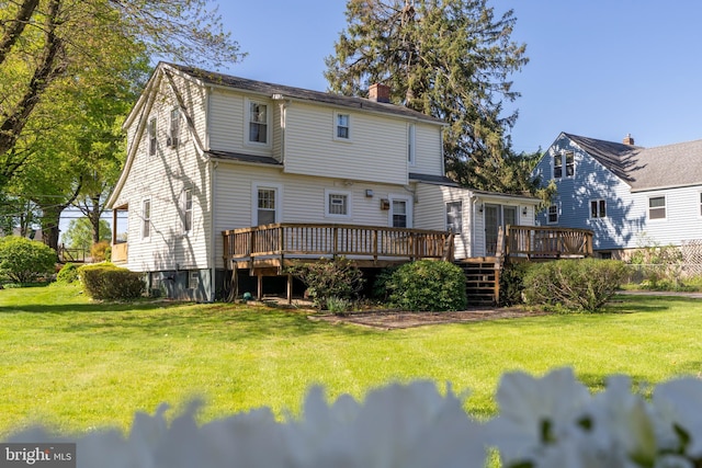 1822 Clearwood Rd, Baltimore, MD 21234 - back of property featuring a wooden deck, a lawn, and a chimney