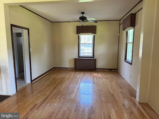 1822 Clearwood Rd, Baltimore, MD 21234 - unfurnished room featuring radiator, light wood finished floors, ceiling fan, ornamental molding, and baseboards