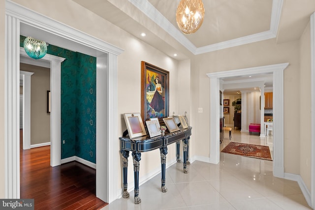 525 Belmont Bay Dr Unit 405, Woodbridge, VA 22191 - foyer entrance with baseboards, a notable chandelier, crown molding, and wood finished floors