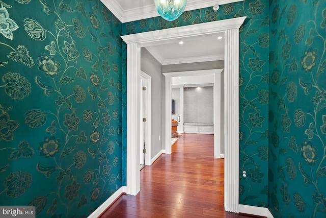 525 Belmont Bay Dr Unit 405, Woodbridge, VA 22191 - hallway with wallpapered walls, dark wood-type flooring, baseboards, and crown molding