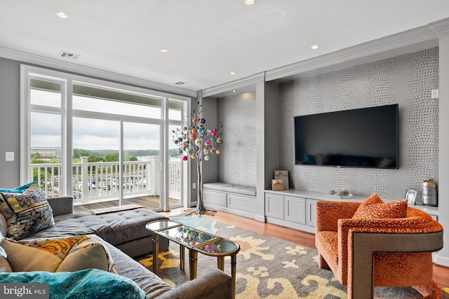 525 Belmont Bay Dr Unit 405, Woodbridge, VA 22191 - living area with crown molding, visible vents, wood finished floors, and recessed lighting