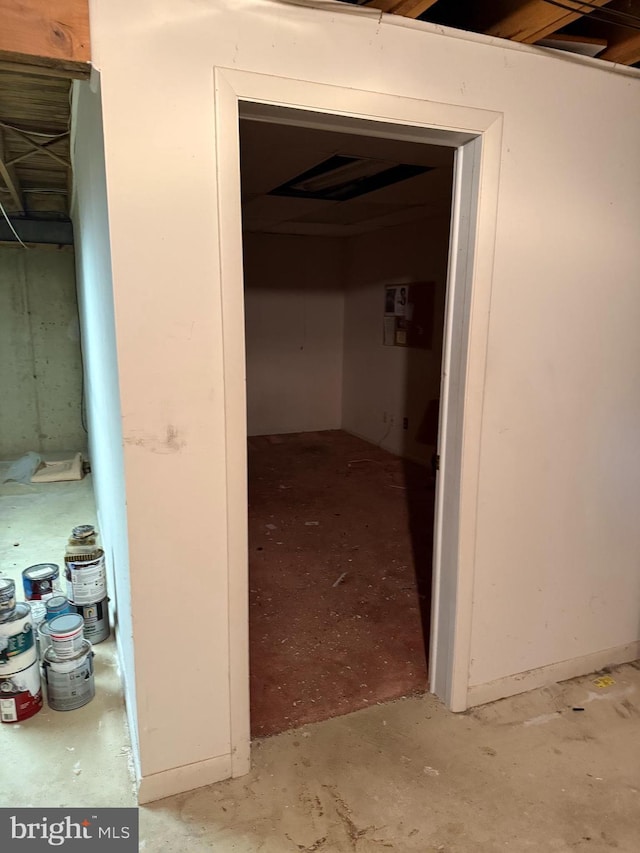 hall with concrete flooring