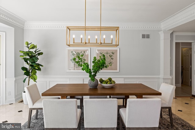 1418 Woodhurst Blvd, Mclean, VA 22102 - dining space featuring light tile patterned floors, crown molding, a decorative wall, a chandelier, and decorative columns