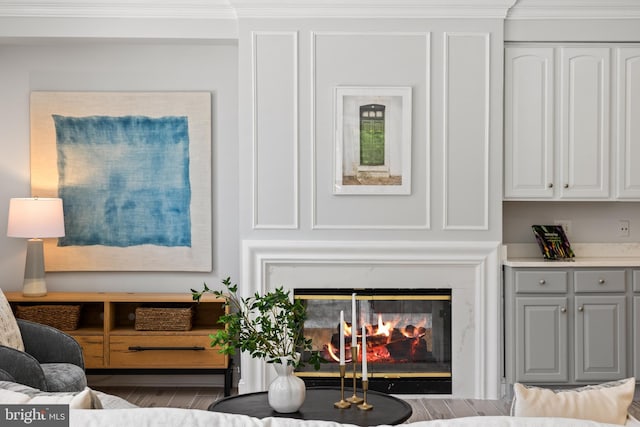 1418 Woodhurst Blvd, Mclean, VA 22102 - living room with crown molding, a high end fireplace, and wood finished floors