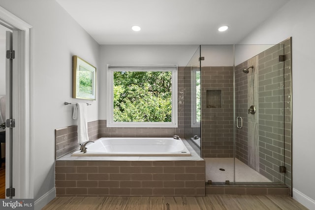1418 Woodhurst Blvd, Mclean, VA 22102 - bathroom featuring a garden tub, a shower stall, wood finished floors, and baseboards